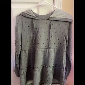 Gray hoodie that has hearts on it
